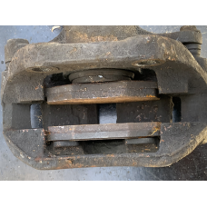 Суппорт гальмівний передній лівий/правий Renault Kangoo  7701207786  7701207787