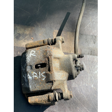 Суппорт гальмівний передній правий Toyota Yaris 4773052020