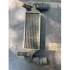 Радіатор інтеркулера на Ford Focus MK1 1084781 Ford XS4Q9L440CA