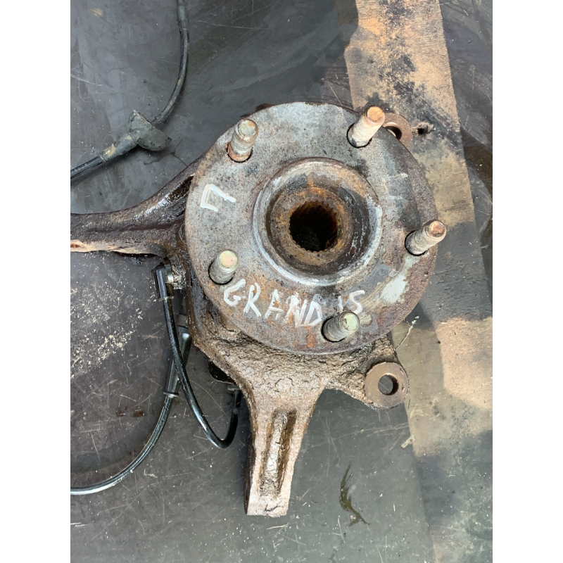 Цапфа передня ліва в зборі Mitsubishi Grandis 2.4 Mivec MR594355