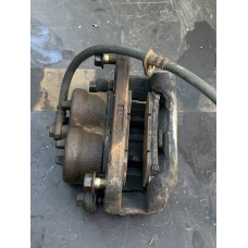 Суппорт гальмівний передній правий у зборі на Mitsubishi Grandis MR407676